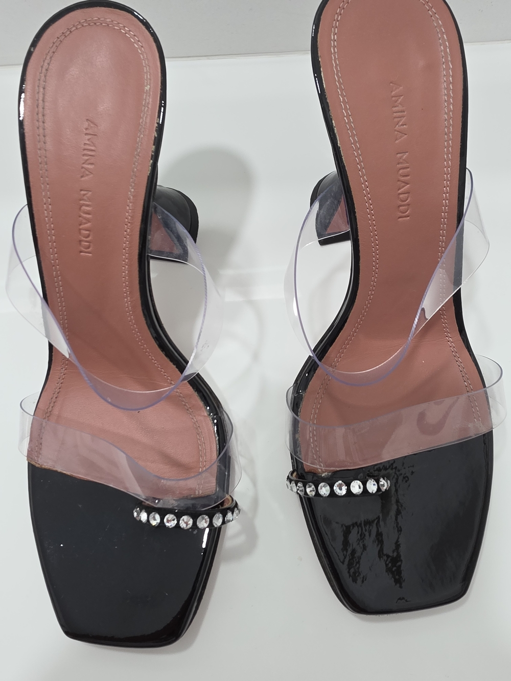 Amina Muaddi Black Patent Slide Heels with Clear Straps and Crystal Trim